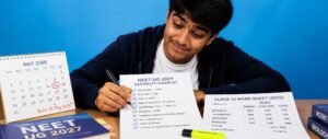 Student confirming NEET 2027 eligibility criteria on a printed checklist
